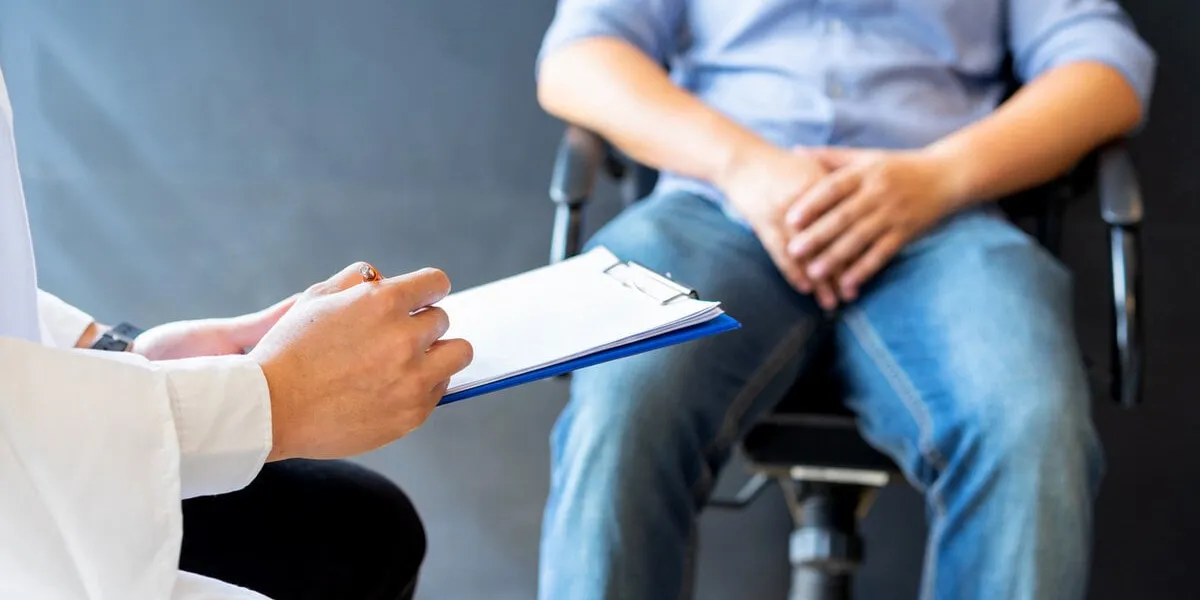 male doctor and prostate cancer patient are discussing about prostate cancer test report diagnostic, prevention of men diseases, healthcare, medical service, consultation, healthy lifestyle concept