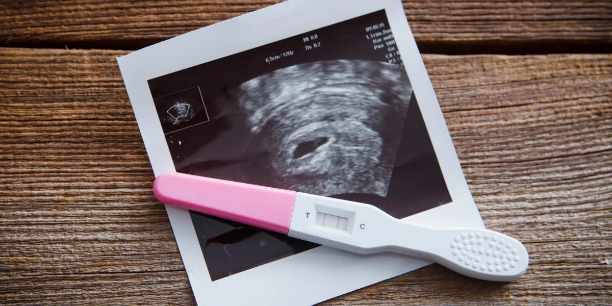 positive pregnany test and a sonogram