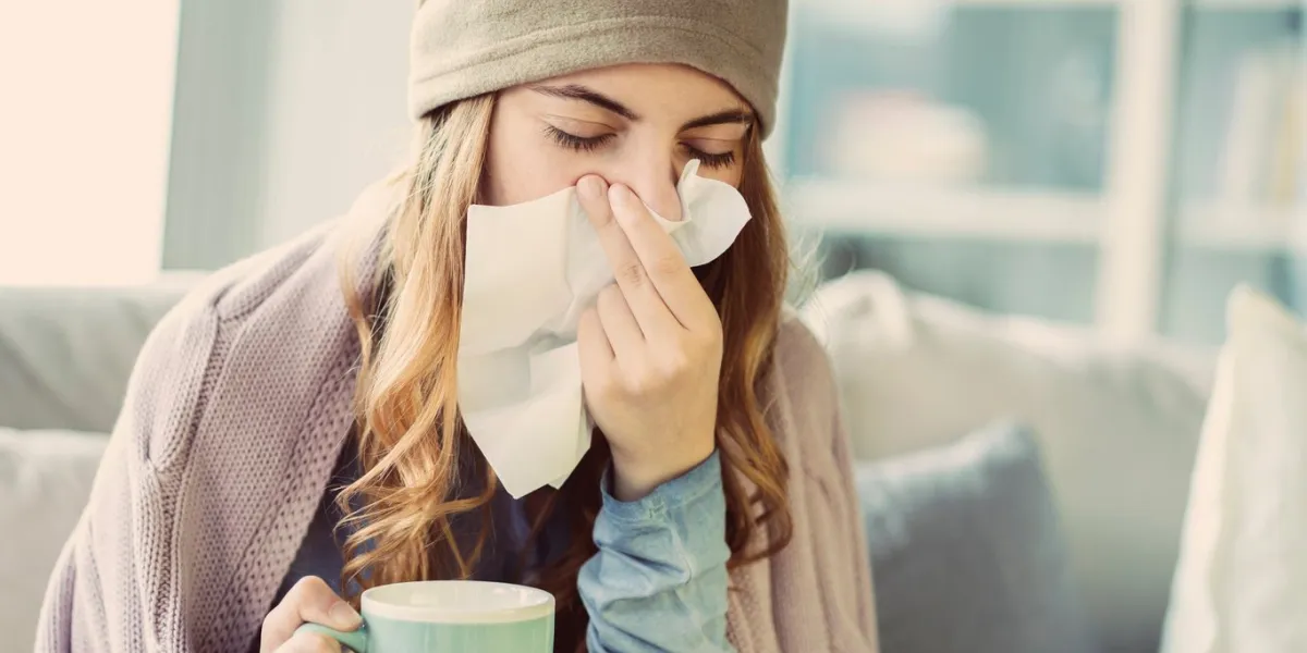 young woman suffering from cold