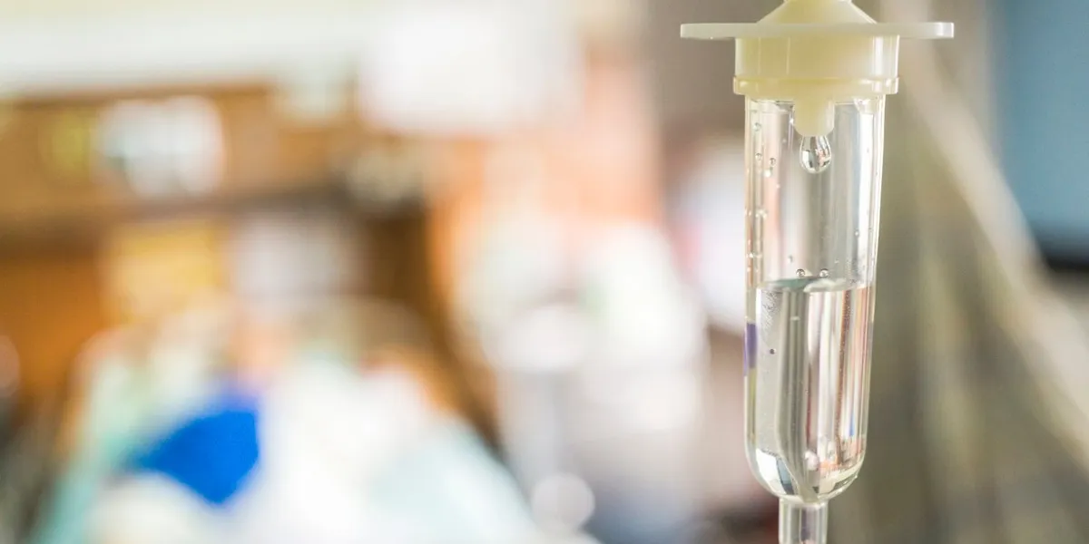 closeup saline intravenous (iv) drip for patient in hospital