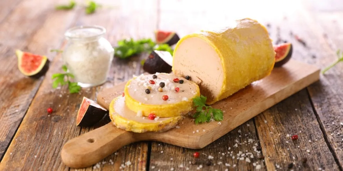 foie gras and fresh fig on wooden board