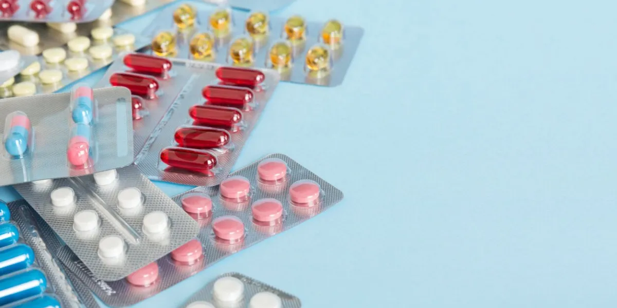 too many different pill of various blisters with different pills medicines storage at home concept medication storing a pile of medicine in blister packs pharmaceutical blister packs