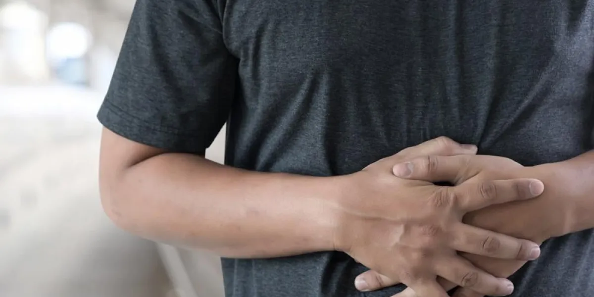 man stomach suffering and having a stomachache