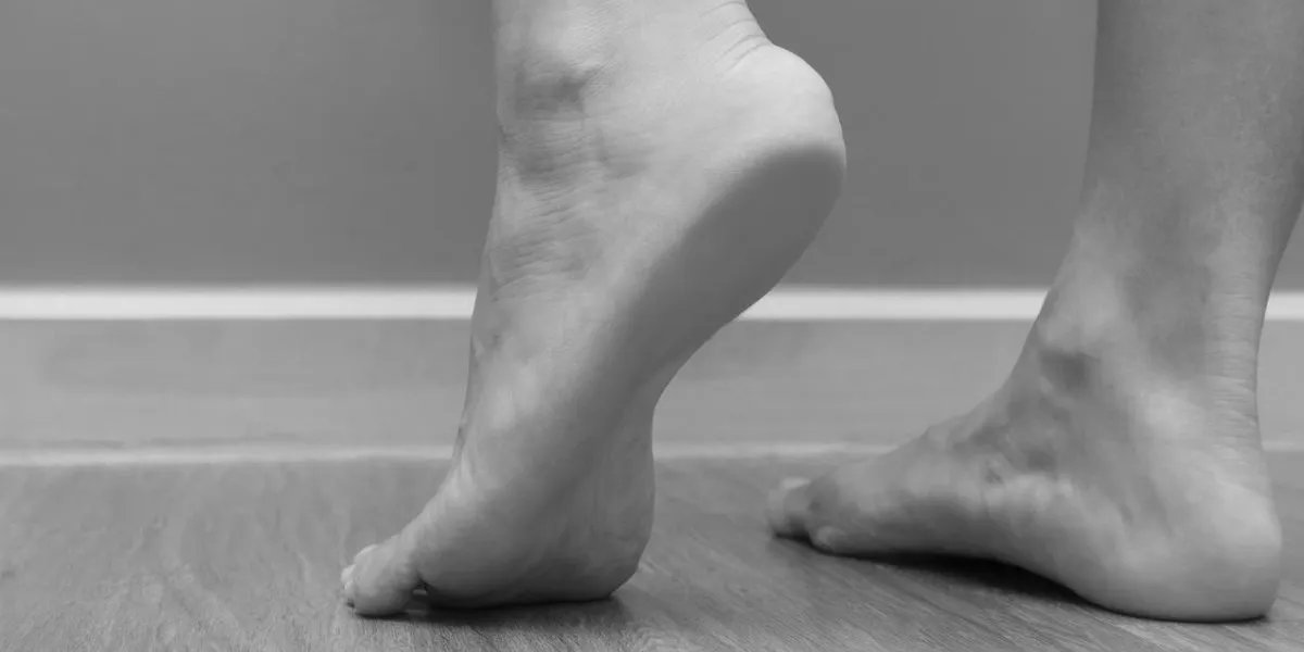 closeup of a female foot heel pain, plantar fasciitis