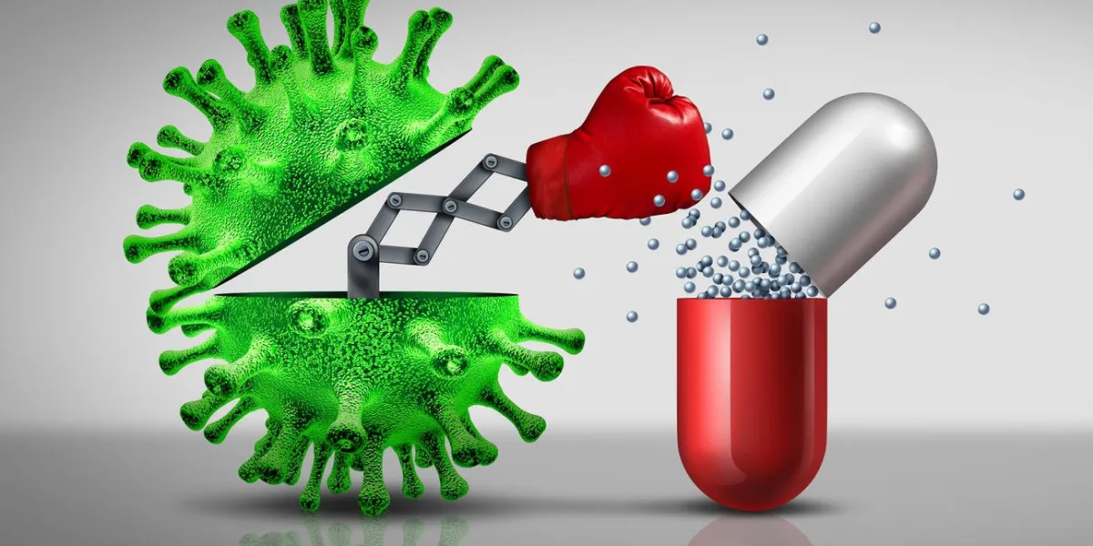 antibiotic resistant virus as a deadly mutated viral cell attacking a pharmaceutical pill with a punch as a medical pathology disease risk as a 3d illustration