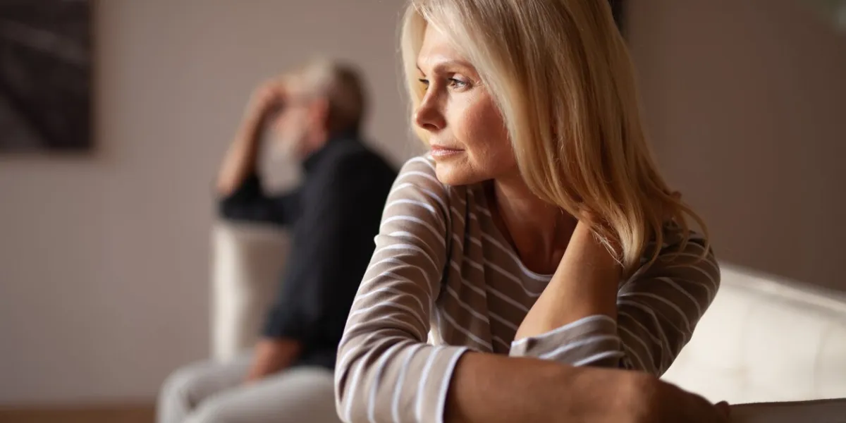 the older couple has a conflict upset mature woman, quarrel with her husband relationship crisis