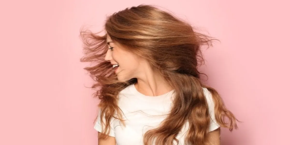 portrait of beautiful young woman on color background