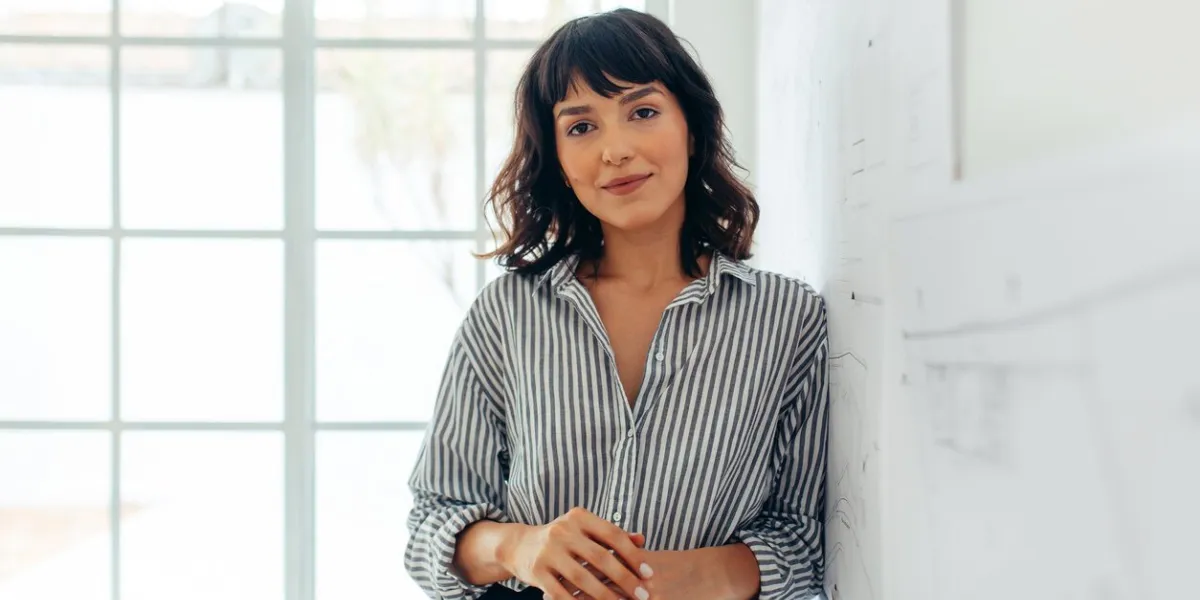 businesswoman standing in office portrait of a confident businesswoman