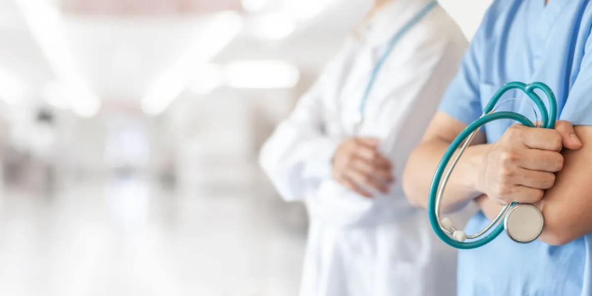 surgeon and anesthetist doctor er surgical team with medical clinic room background for emergency nursing care professional teamwork and patient trust in icu hospital's hospitality concept