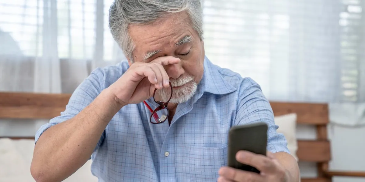 asian elderly man who has eye pain and poor vision, long sighted, glaucoma