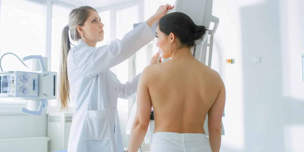 in the hospital, female patients undergoes mammogram screening procedure done by mammography technologist modern technologically advanced clinic with professional doctors breast cancer prevention screening