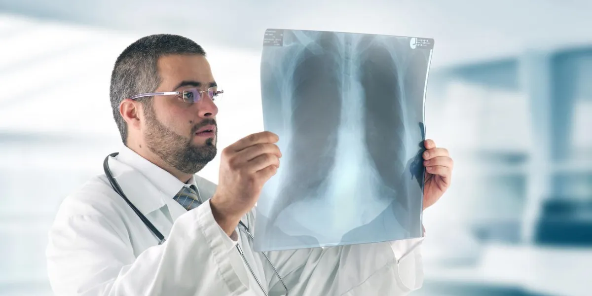 doctor examining an x-ray image