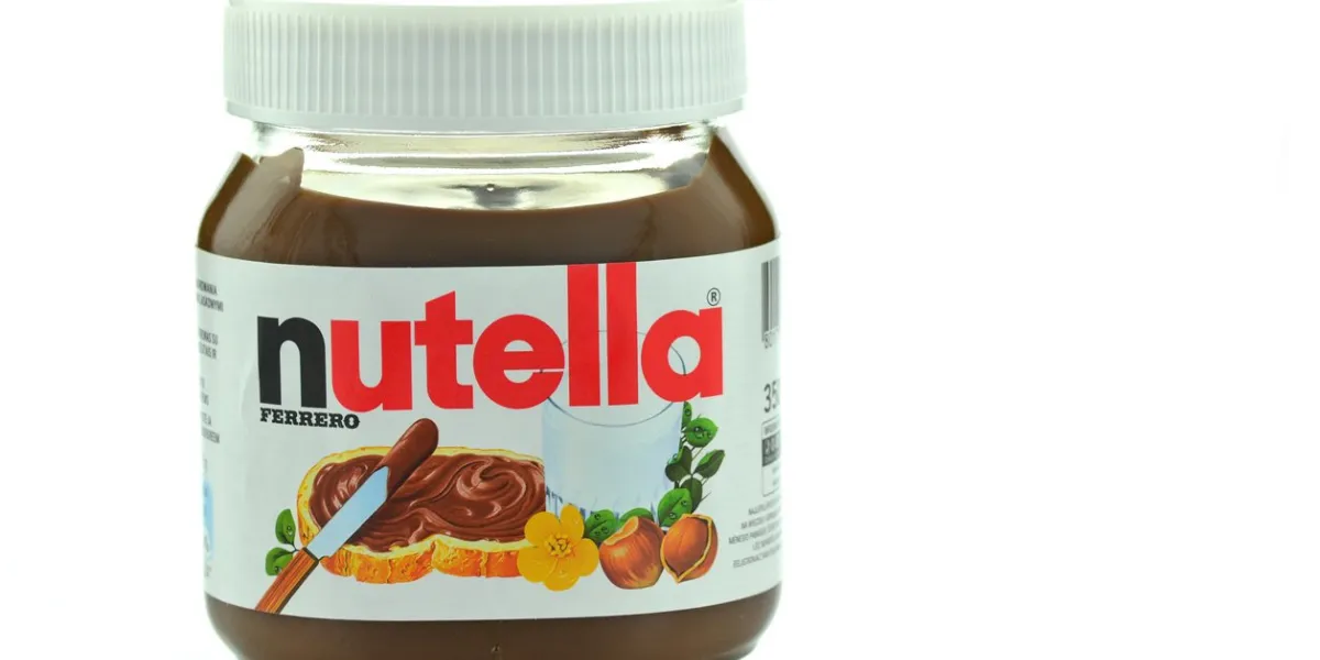kwidzyn, poland - june 3, 2014  jar of nutella chocolate spread isolated on white background nutella hazelnut chocolate spread was introduced by ferrero in