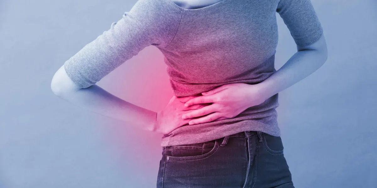 woman with kidney disease on the blue background