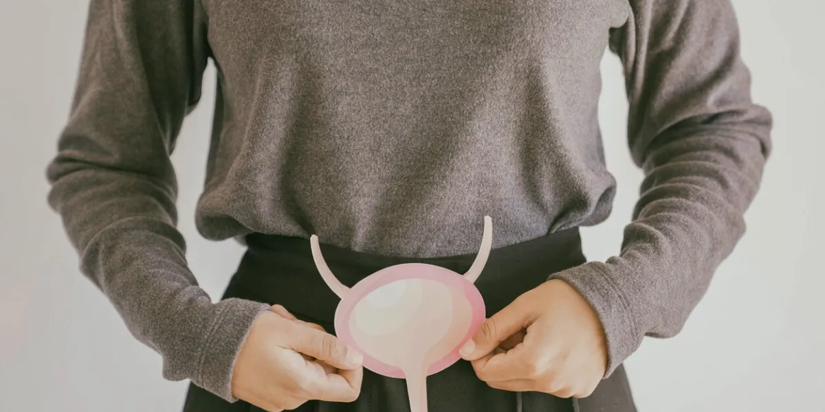 woman holding bladder, cystitis, urethritis and urinary incontinence, bladder cancer concept