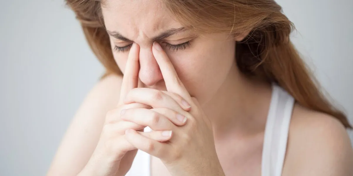 young woman with headache