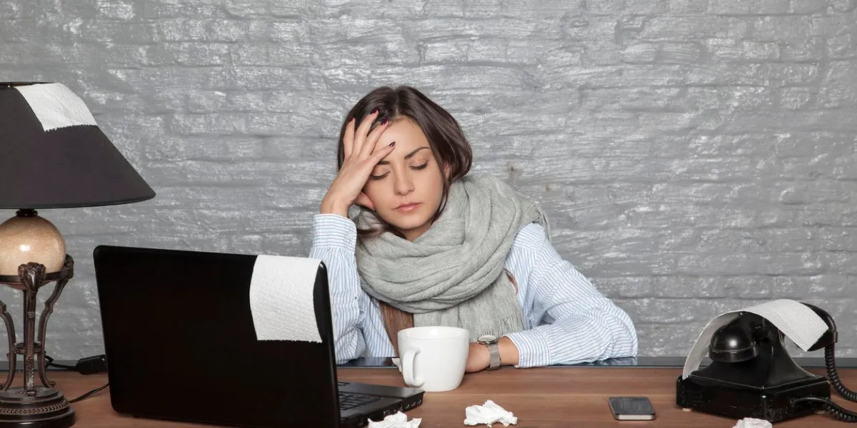 a sick business woman can not focus on work