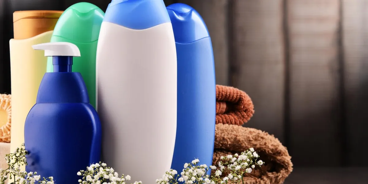 plastic bottles of body care and beauty products