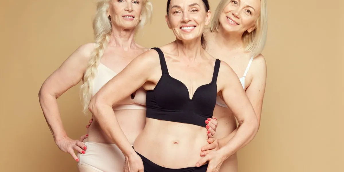 beautiful, positive, elderly women posing in underwear against beige studio background beautiful aging process concept of age, natural beauty body and skin care, healthy lifestyle