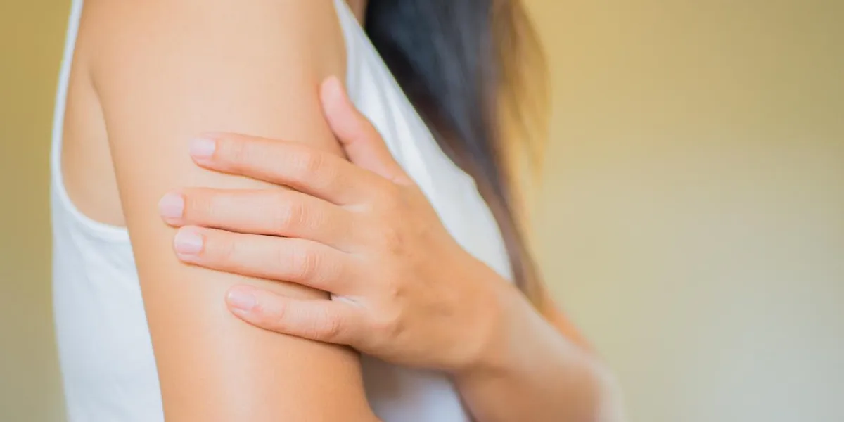 closeup female's arm arm pain and injury health care and medical concept