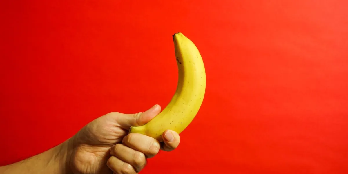 yellow banana, red background