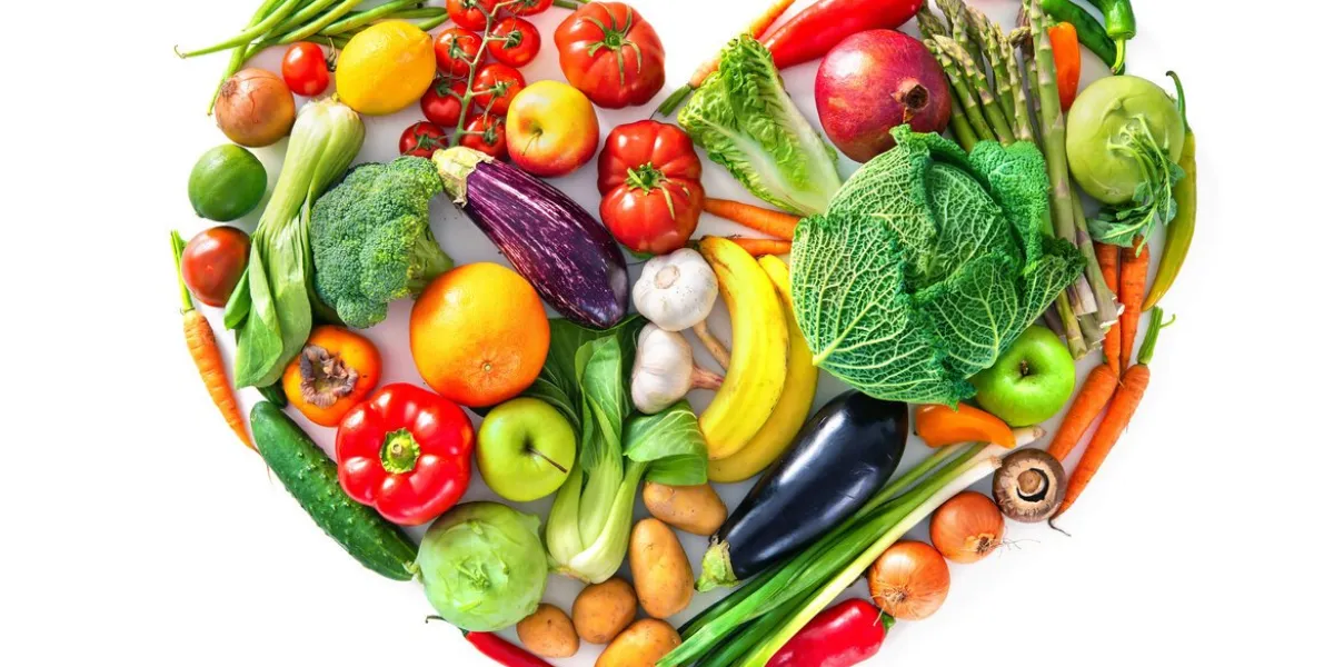 heart shape by various vegetables and fruits healthy food concept isolated on white background
