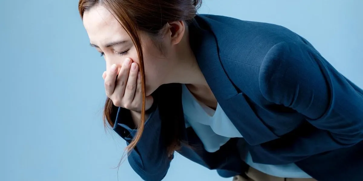 young woman feeling nauseated
