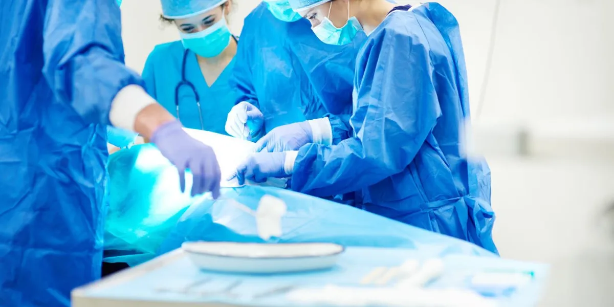 busy surgeon doctors and serious operation