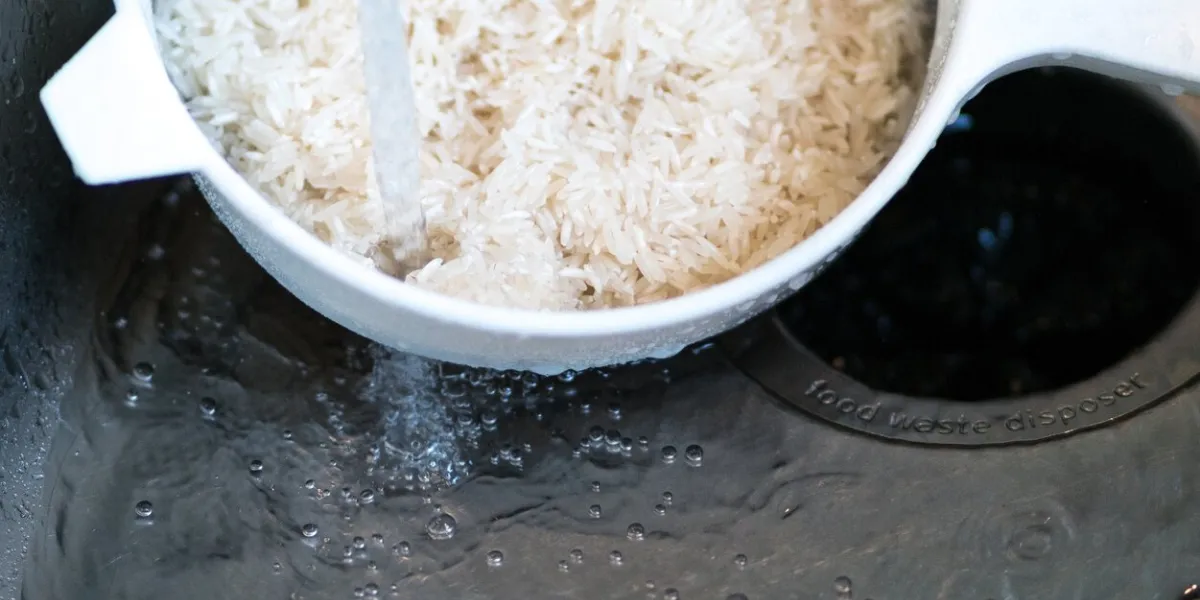 high angle view of washing rice in domestic kitchen sink