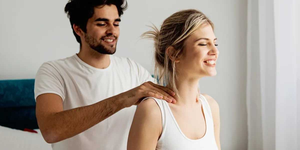 man giving a head massage to his girlfriend