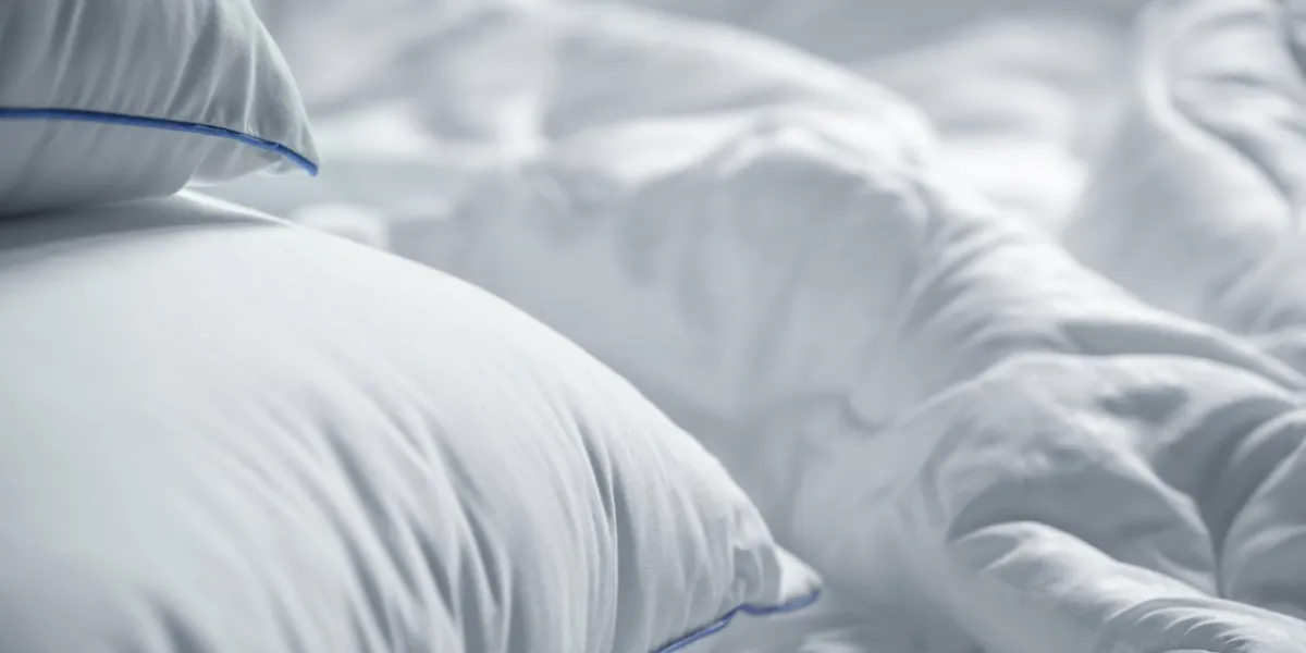 white pillows and blanket wrinkle messy blanket in bedroom after waking up in the morning bed details duvet and blanket, an unmade bed in hotel bedroom with white blanket messy white bed