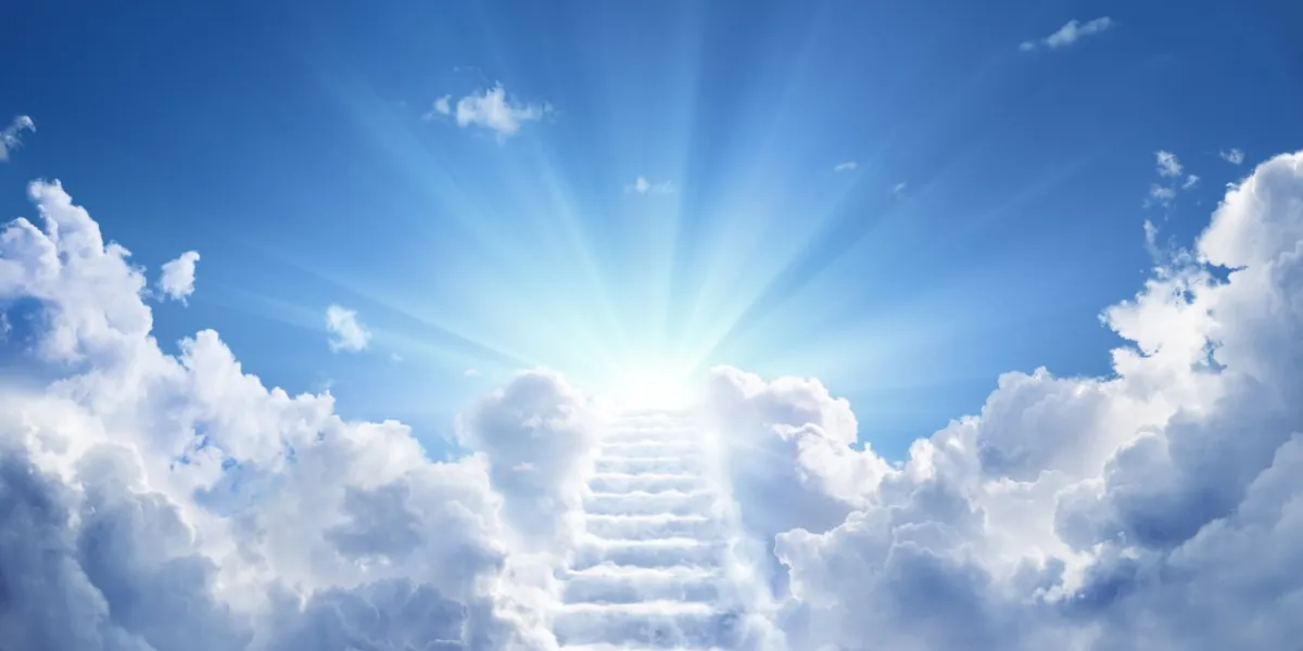stairs leading up to heavenly sky toward the light