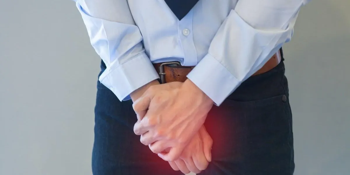 man having a problem with his penis with red spot