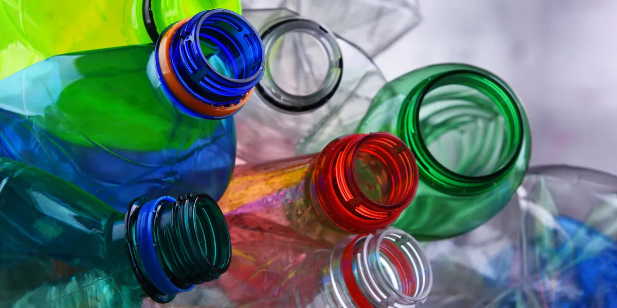 empty colored carbonated drink bottles plastic waste