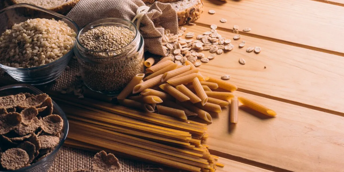 wooden table full of fiber-rich wholegrain foods, perfect for a balanced diet