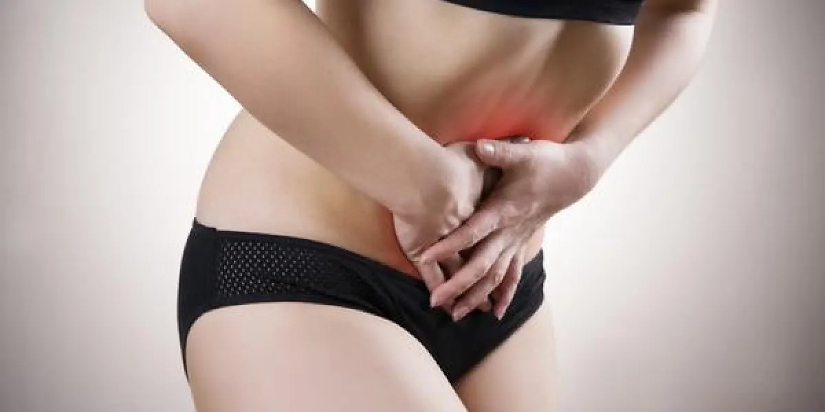 douleur abdominale, brûlures d'estomac, ballonnements sur fond gris point rouge