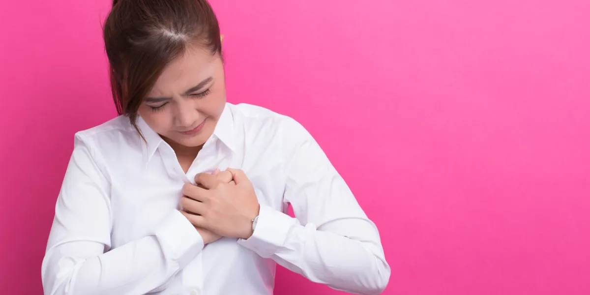 woman has chest pain