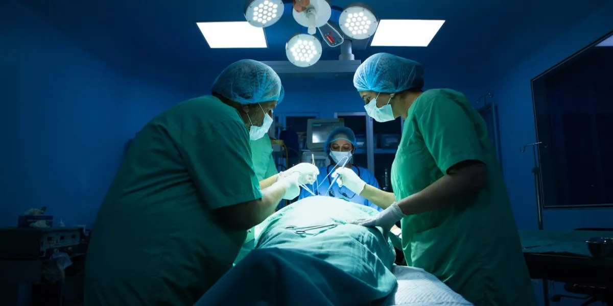 indian surgeons medical team performing surgery in operation theater at hospital medical care concept