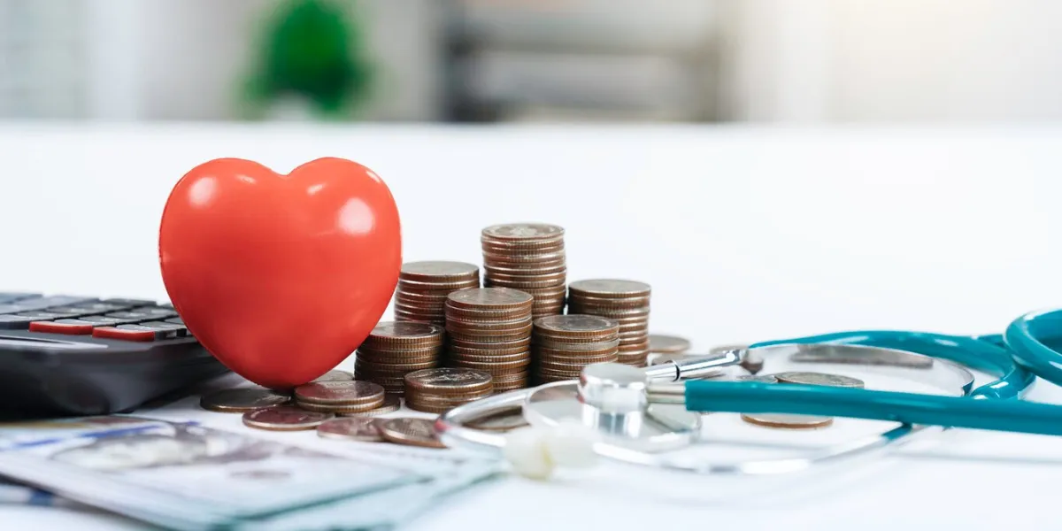 health care insurance for medical expense concept stethoscope and money with red heart in hospital financial management and planning for cost in future finance and investment in healthcare