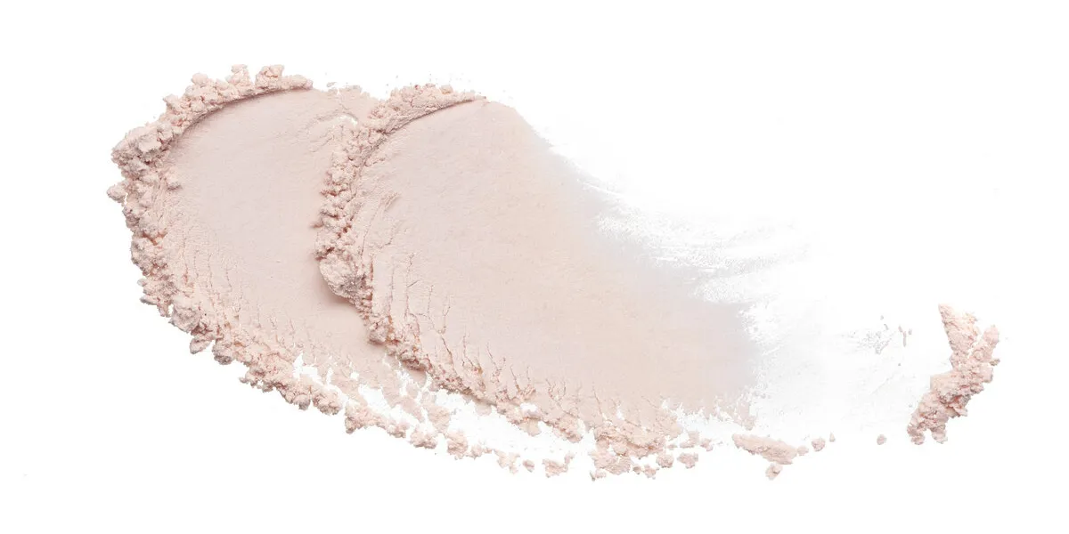 texture of pearl white eye shadow isolated on white background macro texture of broken white powder