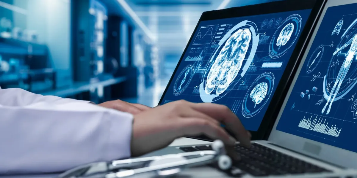 close up of doctor working on tablet and laptop with human brain anatomy display on screen smart medical worker checking hand and diagnosis brain injury while preparing for brain surgery remedial