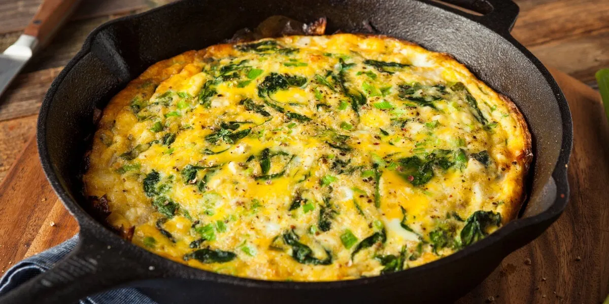 homemade spinach and feta fritatta in a skillet
