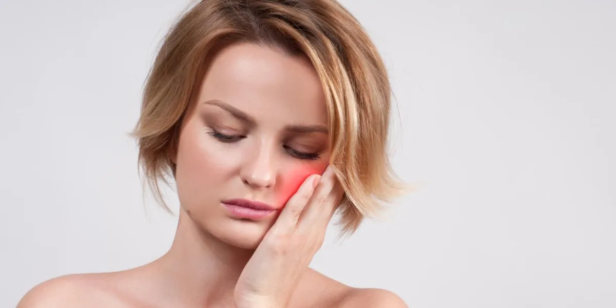 tooth pain and dentistry, woman feeling strong toothache