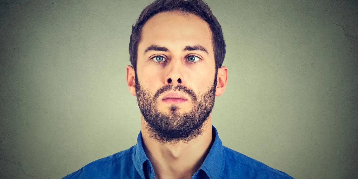 closeup portrait of a cross-eyed man