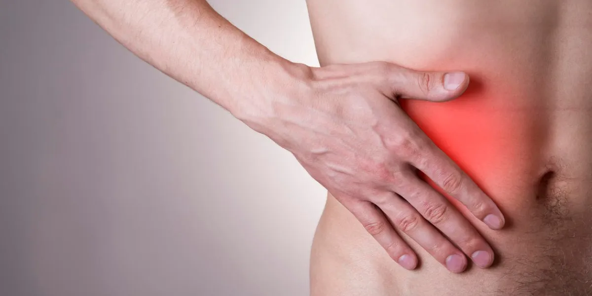 douleur dans le côté droit de l'homme attaque de l'appendicite red dot