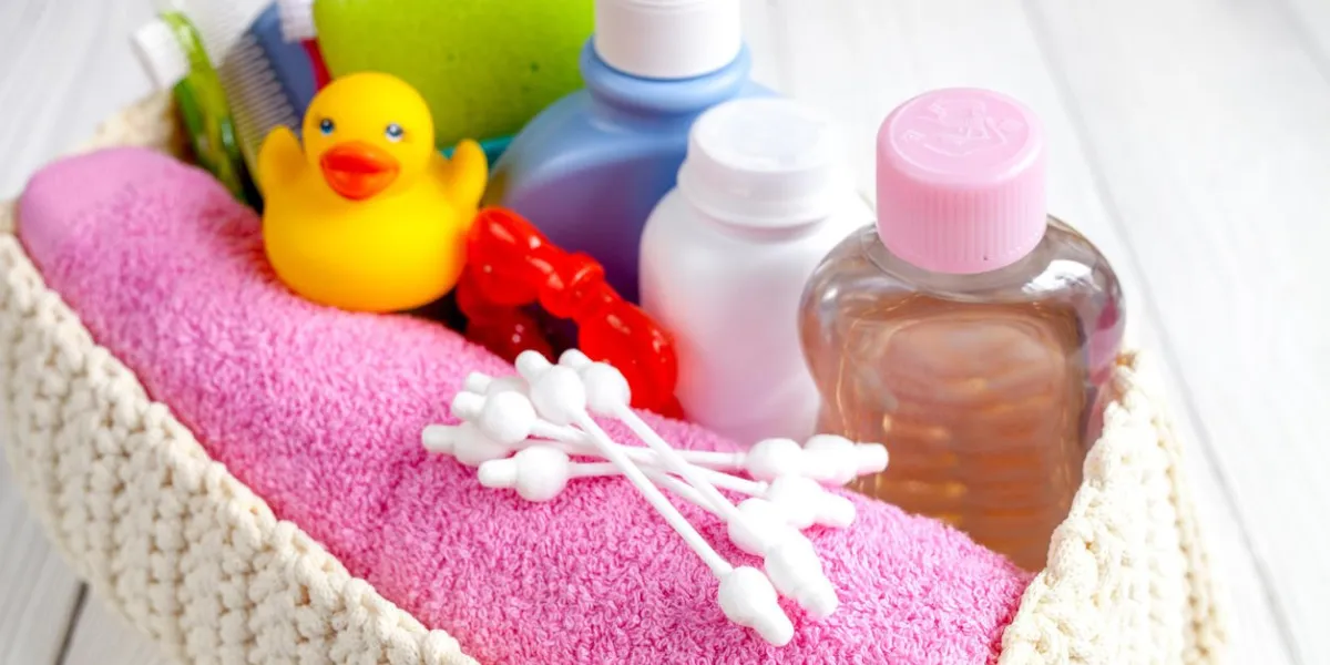 organic cosmetic for children for bath on wooden bakground close up