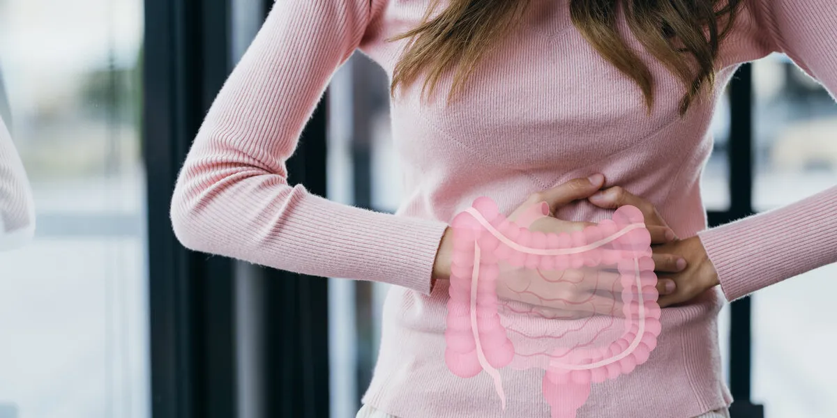woman hands touching on stomach with intestine virtual icon, probiotics food for gut health, colon cancer, bowel inflammatory healthy feminine concept