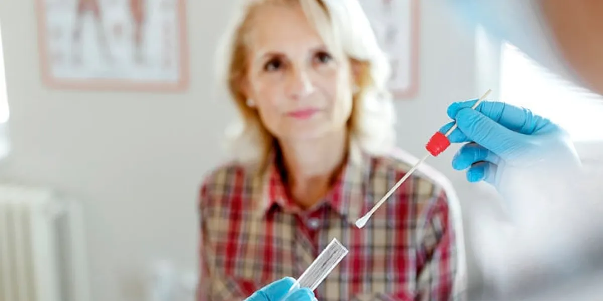view of a male doctor taking a bodily fluid sample for dna test pcr dna testing protocol process