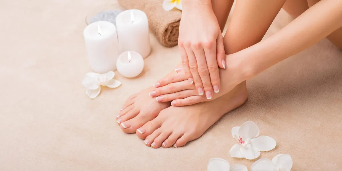 woman at spa with done manicure and pedicure