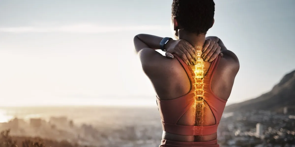 spine injury, skeleton and back pain of fitness woman on mountains with sky background for sports exercise athlete, backache and red body bones for first aid emergency, joint pain and muscle anatomy